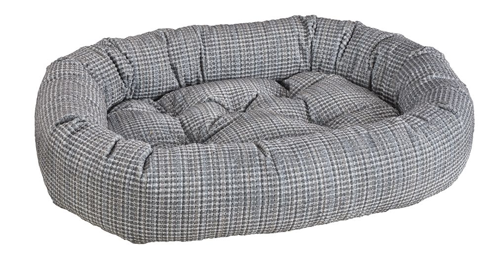 Gray checkered pet bed on a white background