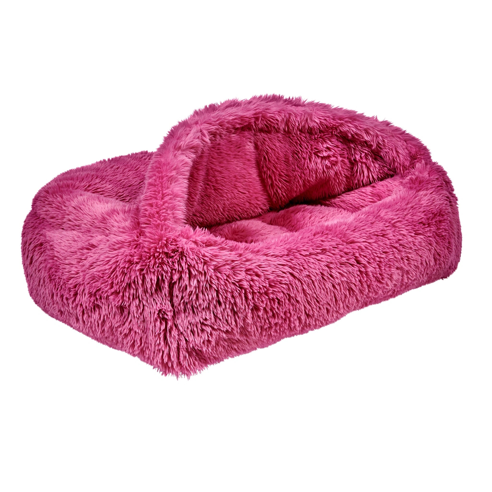 Pink fluffy pet bed on a white background