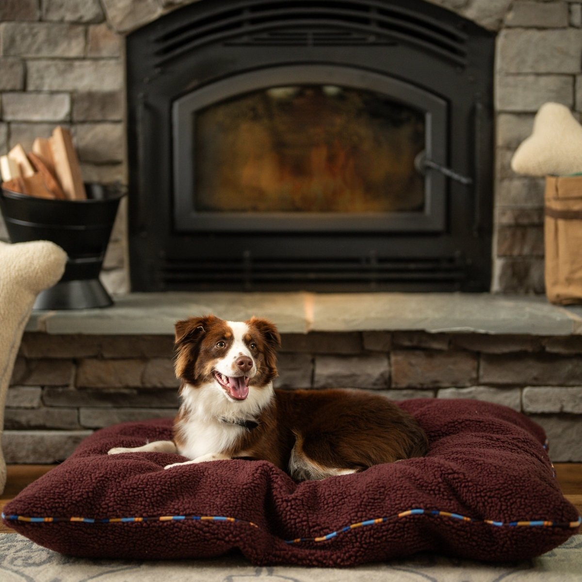Brand Stripe Sherpa Pillow | Wine, with dog by a fireplace