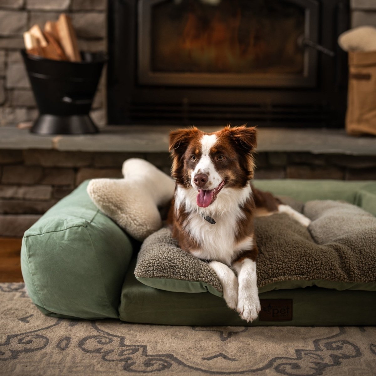Rectangle Pet Couch | Green, with dog by a fireplace