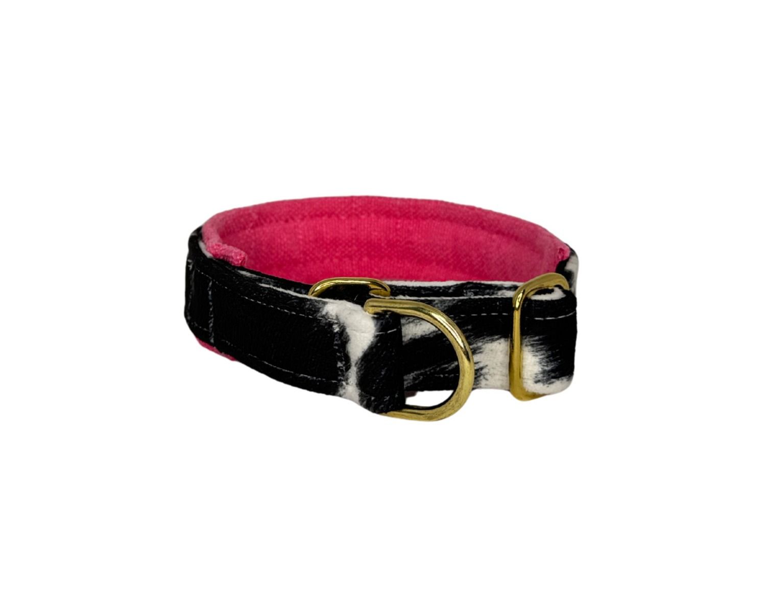Dog collar with black and white pattern and pink interior on a white background